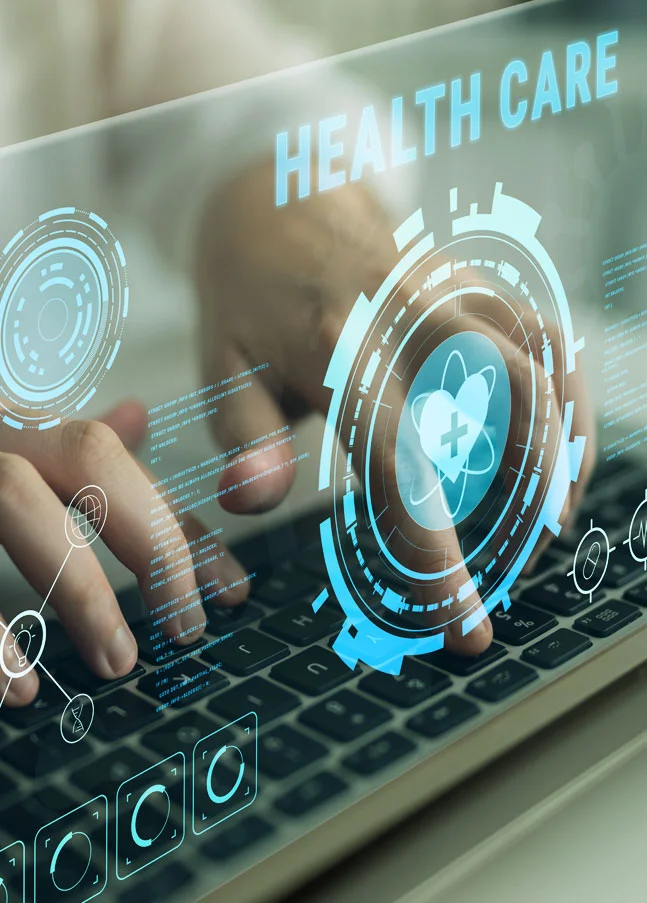 Laptop with a digital healthcare dashboard depicting IT systems and compliance in the regulated healthcare environment.